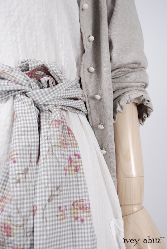 Midsummer Look 39 - Blanchefleur Dress in Dove Striped Voile; Cilla Slip Frock in Signature Cream Washed Silk; Blanchefleur Sash in Shoreline Gingham Crushed Weave; Canterbury Cardigan in Signature Natural Linen Knit by Ivey Abitz