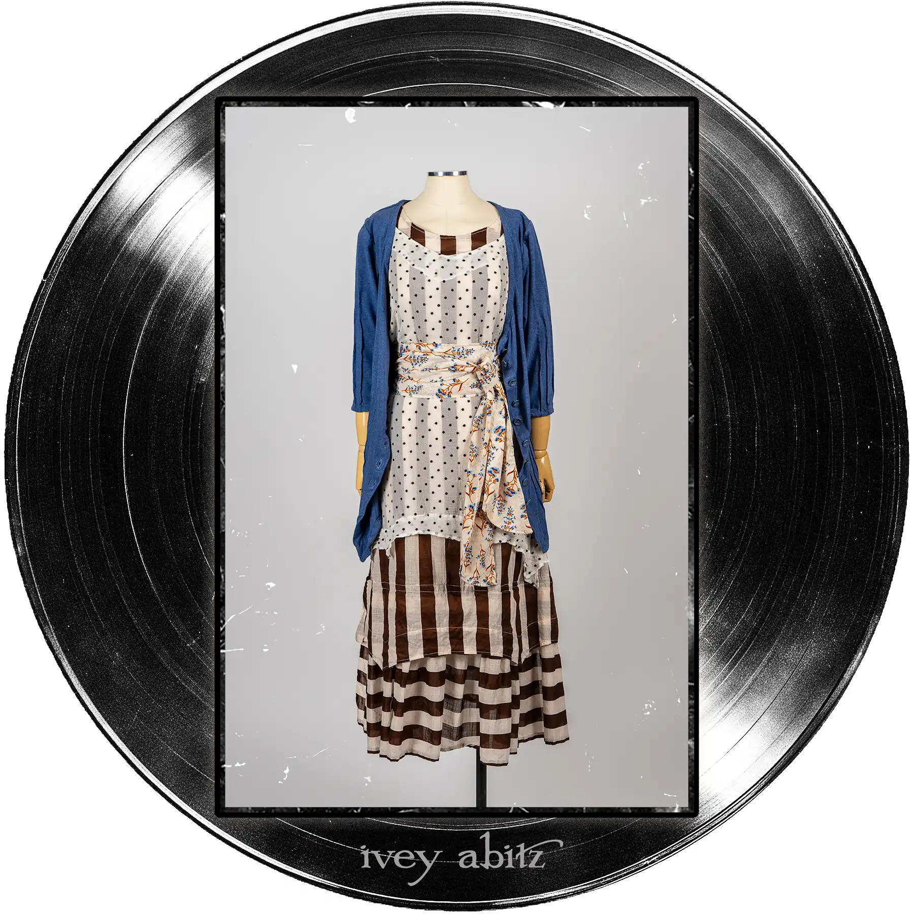 Liberté Frock in Record Case Stripe Voile; Bedloe Frock in Record Case Embroidered Dot Silk Chiffon; Blanchefleur Sash in Far Beyond Forever Floral Weave; Gweneviere Cardigan in Far Beyond Forever Heathered Knit.
