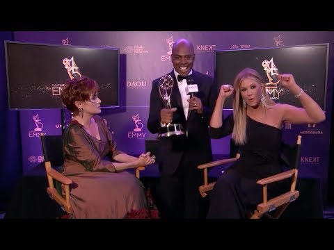 Entertainment Tonight Host Kevin Frazier loves the Carolyn Hennesy Ivey Abitz gown.