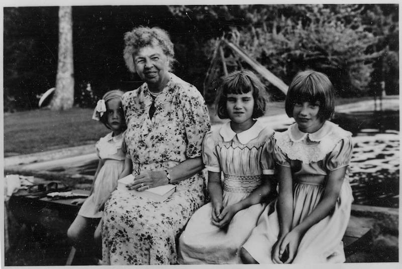 Eleanor next to pool with her granddaughters at Val-Kill Cottage. She's wearing the floral print that inspired our Liberty Forget-Me-Not Weave. Courtesy FDR Library.