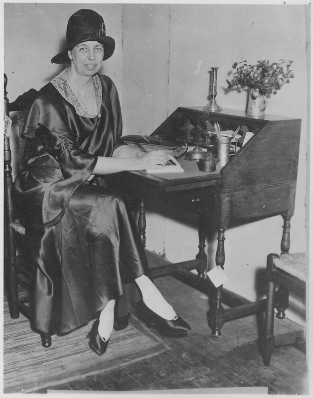 Eleanor at an antique show in the Grand Central Palace, New York City, with her exhibit of early American Colonial Furniture made at Val-Kill. When the furniture factory closed in the 1930's, she made it into her full-time home.