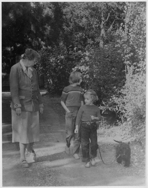Eleanor walks on trails at Val-Kill with her granddaughters, Nina and Sally, and Fala. Circa 1951. Hyde Park, New York. Photograph courtesy FDR Library.