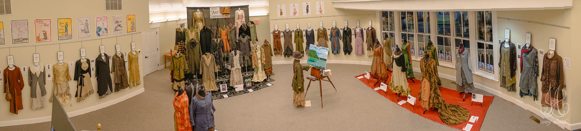 A view of the 20 year retrospective exhibit featuring Ivey Abitz ensembles on dress forms.