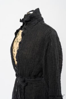 Scattergood Duster Coat in Black Crinkled Washed Linen; Scattergood Frock in Arthurian Green Floral Washed Linen. By Ivey Abitz
