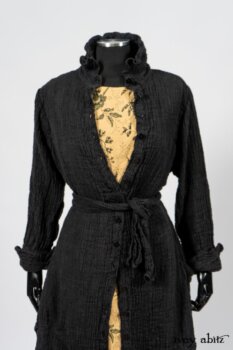 Scattergood Duster Coat in Black Crinkled Washed Linen; Scattergood Frock in Arthurian Green Floral Washed Linen. By Ivey Abitz