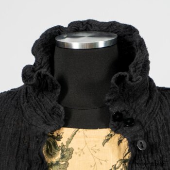 Scattergood Duster Coat in Black Crinkled Washed Linen; Scattergood Frock in Arthurian Green Floral Washed Linen. By Ivey Abitz