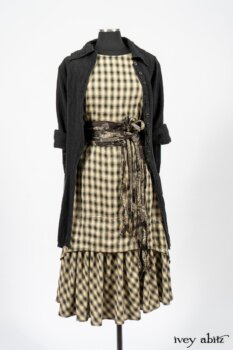 Elsie Duster Coat in Black Puckered Check Weave; Blanchefleur Frock in Black and Natural Plaid Weave; Porte Cochere Sash in Black and Natural Embroidered Floral Weave. By Ivey Abitz