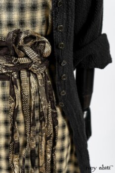 Elsie Duster Coat in Black Puckered Check Weave; Blanchefleur Frock in Black and Natural Plaid Weave; Porte Cochere Sash in Black and Natural Embroidered Floral Weave. By Ivey Abitz