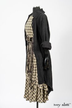 Elsie Duster Coat in Black Puckered Check Weave; Blanchefleur Frock in Black and Natural Plaid Weave; Porte Cochere Sash in Black and Natural Embroidered Floral Weave. By Ivey Abitz