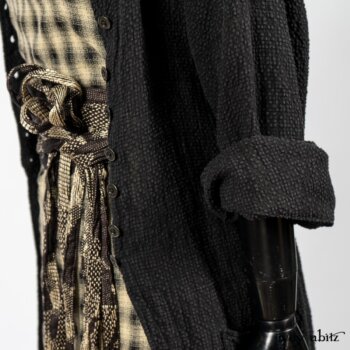 Elsie Duster Coat in Black Puckered Check Weave; Blanchefleur Frock in Black and Natural Plaid Weave; Porte Cochere Sash in Black and Natural Embroidered Floral Weave. By Ivey Abitz