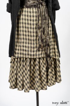 Elsie Duster Coat in Black Puckered Check Weave; Blanchefleur Frock in Black and Natural Plaid Weave; Porte Cochere Sash in Black and Natural Embroidered Floral Weave. By Ivey Abitz