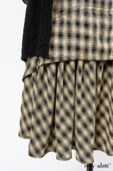 Elsie Duster Coat in Black Puckered Check Weave; Blanchefleur Frock in Black and Natural Plaid Weave; Porte Cochere Sash in Black and Natural Embroidered Floral Weave. By Ivey Abitz