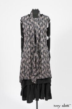Wildefield Frock in Wolfie Grey Floral Voile; Limited Edition Blanchefleur Sash in Wolfie Grey Floral Voile; Blanchefleur Frock in Black Puckered Check Weave. By Ivey Abitz