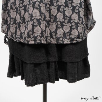 Wildefield Frock in Wolfie Grey Floral Voile; Limited Edition Blanchefleur Sash in Wolfie Grey Floral Voile; Blanchefleur Frock in Black Puckered Check Weave. By Ivey Abitz
