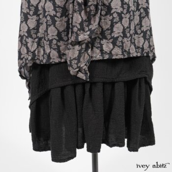 Wildefield Frock in Wolfie Grey Floral Voile; Limited Edition Blanchefleur Sash in Wolfie Grey Floral Voile; Blanchefleur Frock in Black Puckered Check Weave. By Ivey Abitz