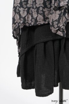 Wildefield Frock in Wolfie Grey Floral Voile; Limited Edition Blanchefleur Sash in Wolfie Grey Floral Voile; Blanchefleur Frock in Black Puckered Check Weave. By Ivey Abitz