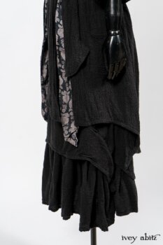 Elsie Duster Coat in Black Puckered Check Weave; Limited Edition Blanchefleur Sash in Wolfie Grey Floral Voile; Blanchefleur Frock in Black Puckered Check Weave. By Ivey Abitz