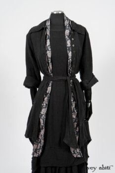 Elsie Duster Coat in Black Puckered Check Weave; Limited Edition Blanchefleur Sash in Wolfie Grey Floral Voile; Blanchefleur Frock in Black Puckered Check Weave. By Ivey Abitz