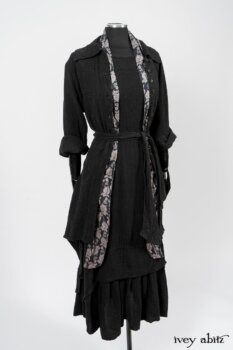 Elsie Duster Coat in Black Puckered Check Weave; Limited Edition Blanchefleur Sash in Wolfie Grey Floral Voile; Blanchefleur Frock in Black Puckered Check Weave. By Ivey Abitz