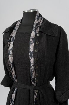 Elsie Duster Coat in Black Puckered Check Weave; Limited Edition Blanchefleur Sash in Wolfie Grey Floral Voile; Blanchefleur Frock in Black Puckered Check Weave. By Ivey Abitz