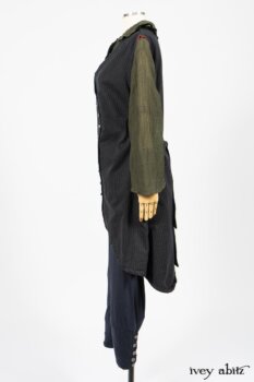 Limited Edition Arthur Hill Frock in Royal Pinstripe Twill; Limited Edition Arthur Hill Shirt in Arthurian Green Cotton Voile; Pierrepont Leggings Breeches in Fresh Water Melange Knit. By Ivey Abitz