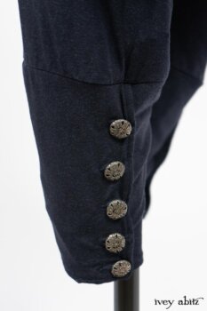 Limited Edition Arthur Hill Frock in Royal Pinstripe Twill; Limited Edition Arthur Hill Shirt in Arthurian Green Cotton Voile; Pierrepont Leggings Breeches in Fresh Water Melange Knit. By Ivey Abitz