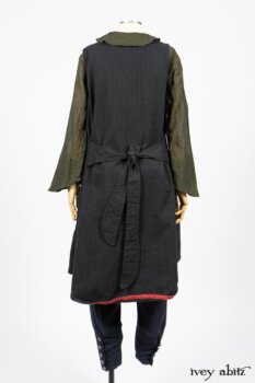 Limited Edition Arthur Hill Frock in Royal Pinstripe Twill; Limited Edition Arthur Hill Shirt in Arthurian Green Cotton Voile; Pierrepont Leggings Breeches in Fresh Water Melange Knit. By Ivey Abitz