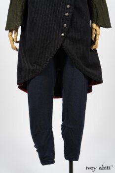 Limited Edition Arthur Hill Frock in Royal Pinstripe Twill; Limited Edition Arthur Hill Shirt in Arthurian Green Cotton Voile; Pierrepont Leggings Breeches in Fresh Water Melange Knit. By Ivey Abitz