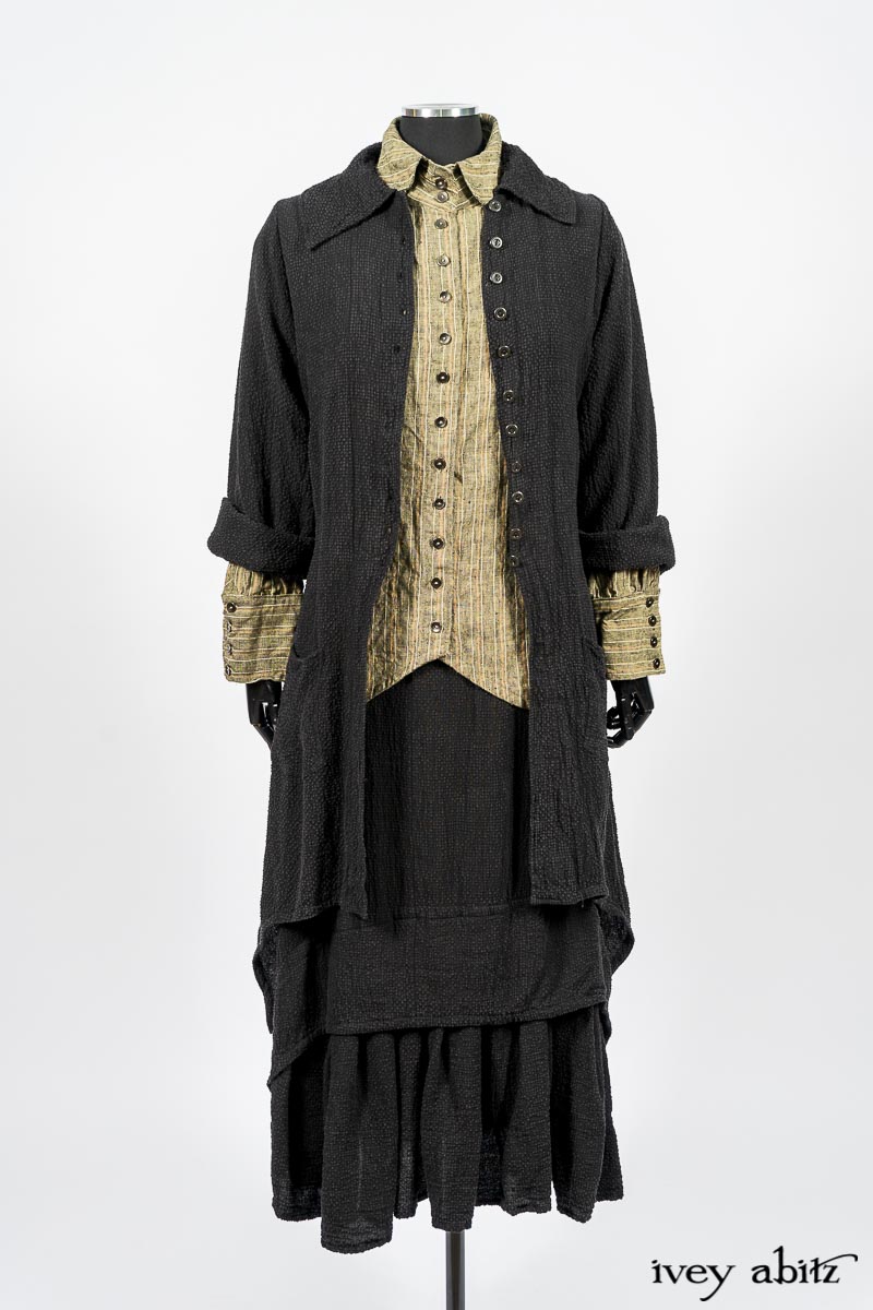 Truitt Shirt in Peace and Civility Stripe Linen; Elsie Duster Coat in Black Puckered Check Weave; Blanchefleur Frock in Black Puckered Check Weave. By Ivey Abitz