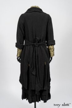 Truitt Shirt in Peace and Civility Stripe Linen; Elsie Duster Coat in Black Puckered Check Weave; Blanchefleur Frock in Black Puckered Check Weave. By Ivey Abitz