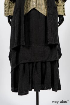 Truitt Shirt in Peace and Civility Stripe Linen; Elsie Duster Coat in Black Puckered Check Weave; Blanchefleur Frock in Black Puckered Check Weave. By Ivey Abitz