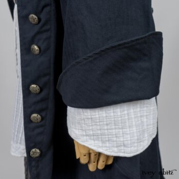 Highlands Shirt in White Wainscot Weave; Limited Edition Porte Cochere Sash in Cottage Garden Weave; Arthur Hill Jacket in Lakeland Washed Herringbone; Montague Trousers in Lakeland Woven Stripe. By Ivey Abitz