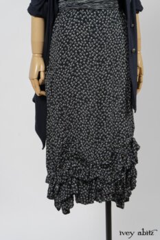 Fennefleur Frock in Lakeland Flutter Weave; Limited Edition Fairholme Sash in Lakeland and White Crinkled Weave; Cavendish Cardigan in Fresh Water Melange Knit. By Ivey Abitz