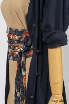 Cavendish Cardigan in Fresh Water Melange Knit; Limited Edition Porte Cochere Sash in Cottage Garden Weave; Blanchefleur Frock in Sun and Sand Washed Stripe. By Ivey Abitz