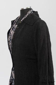 Elsie Duster Coat in Black Puckered Check Weave; Limited Edition Blanchefleur Sash in Wolfie Grey Floral Voile; Wildefield Frock in Wolfie Grey Floral Voile; Blanchefleur Frock in Black Puckered Check Weave. By Ivey Abitz