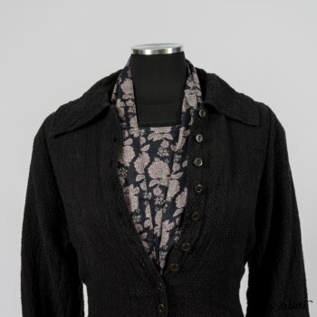 Elsie Duster Coat in Black Puckered Check Weave; Limited Edition Blanchefleur Sash in Wolfie Grey Floral Voile; Wildefield Frock in Wolfie Grey Floral Voile; Blanchefleur Frock in Black Puckered Check Weave. By Ivey Abitz
