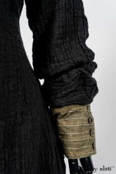 Scattergood Duster Coat in Black Crinkled Washed Linen; Scattergood Frock in Arthurian Green Floral Washed Linen; Truitt Shirt in Peace and Civility Stripe Linen. By Ivey Abitz