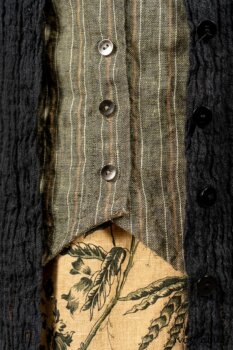 Scattergood Duster Coat in Black Crinkled Washed Linen; Scattergood Frock in Arthurian Green Floral Washed Linen; Truitt Shirt in Peace and Civility Stripe Linen. By Ivey Abitz
