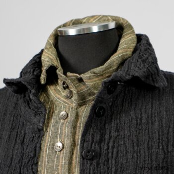 Scattergood Duster Coat in Black Crinkled Washed Linen; Scattergood Frock in Arthurian Green Floral Washed Linen; Truitt Shirt in Peace and Civility Stripe Linen. By Ivey Abitz