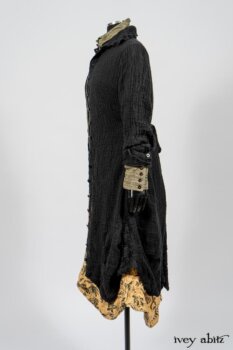 Scattergood Duster Coat in Black Crinkled Washed Linen; Scattergood Frock in Arthurian Green Floral Washed Linen; Truitt Shirt in Peace and Civility Stripe Linen. By Ivey Abitz