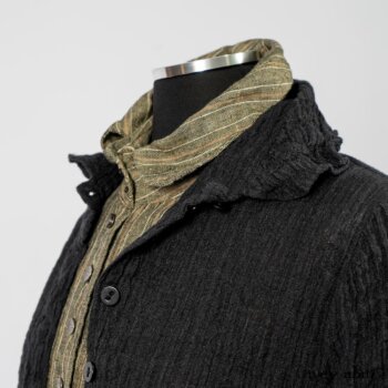 Scattergood Duster Coat in Black Crinkled Washed Linen; Scattergood Frock in Arthurian Green Floral Washed Linen; Truitt Shirt in Peace and Civility Stripe Linen. By Ivey Abitz