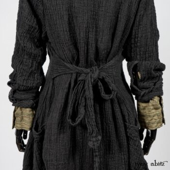 Scattergood Duster Coat in Black Crinkled Washed Linen; Scattergood Frock in Arthurian Green Floral Washed Linen; Truitt Shirt in Peace and Civility Stripe Linen. By Ivey Abitz