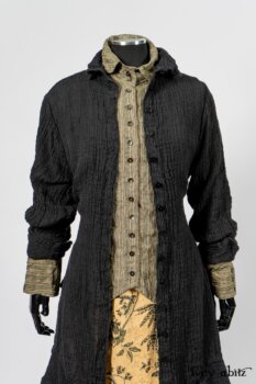 Scattergood Duster Coat in Black Crinkled Washed Linen; Scattergood Frock in Arthurian Green Floral Washed Linen; Truitt Shirt in Peace and Civility Stripe Linen. By Ivey Abitz