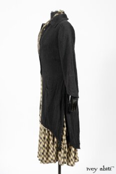 Clotaire Sash in Black and Natural Embroidered Floral Weave; Blanchefleur Frock in Black and Natural Plaid Weave; Elsie Duster Coat in Black Puckered Check Weave. By Ivey Abitz