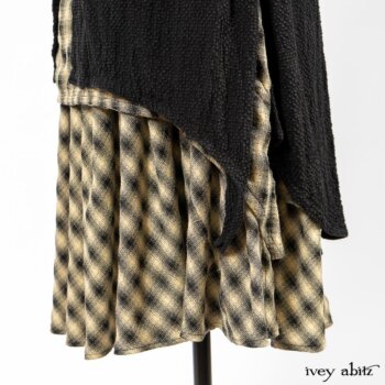 Clotaire Sash in Black and Natural Embroidered Floral Weave; Blanchefleur Frock in Black and Natural Plaid Weave; Elsie Duster Coat in Black Puckered Check Weave. By Ivey Abitz