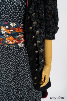 Limited Edition Elliot Jacket in Lakeland Floral Lace Knit; Limited Edition Arthur Hill Frock in Royal Pinstripe Twill; Limited Edition Porte Cochere Sash in Cottage Garden Weave; Fennefleur Frock in Lakeland Flutter Weave. By Ivey Abitz