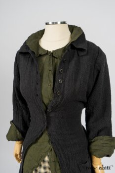 Elsie Duster Coat in Black Puckered Check Weave; Limited Edition Arthur Hill Shirt in Arthurian Green Cotton Voile; Blanchefleur Trousers in Black and Natural Plaid Weave. By Ivey Abitz