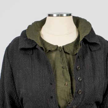 Elsie Duster Coat in Black Puckered Check Weave; Limited Edition Arthur Hill Shirt in Arthurian Green Cotton Voile; Blanchefleur Trousers in Black and Natural Plaid Weave. By Ivey Abitz