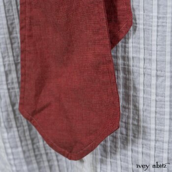 Highlands Shirt in White Clapboard Weave; Fairholme Necktie in Red Door Washed Cotton; Montague Trousers in Lakeland Woven Stripe. By Ivey Abitz