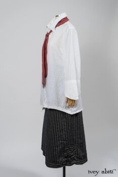 Highlands Shirt in White Clapboard Weave; Fairholme Necktie in Red Door Washed Cotton; Montague Trousers in Lakeland Woven Stripe. By Ivey Abitz
